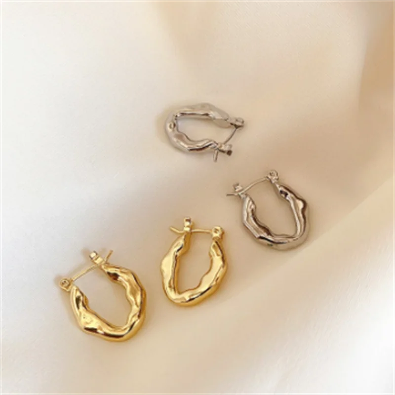 Дизайнерские текстурные золотые серьги геометрические простые круглые с