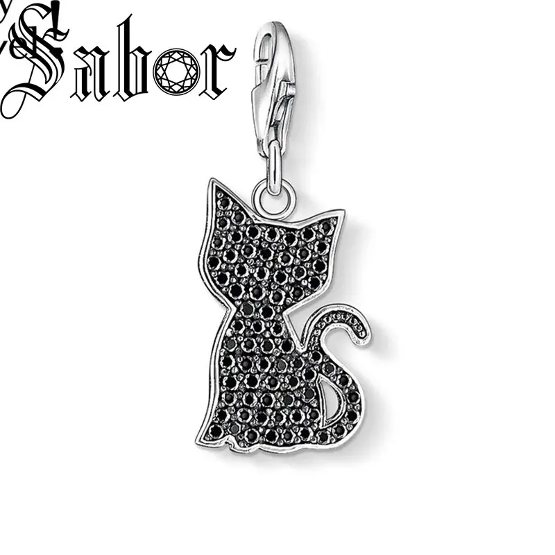 Черный кот маленький котенок очарование женщин животное любовник посеребренный