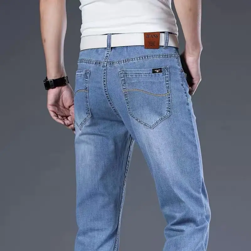 2021light jeans men's plus size straight loose elastic high-end tide brand light blue and white casual trousers bleached jeans