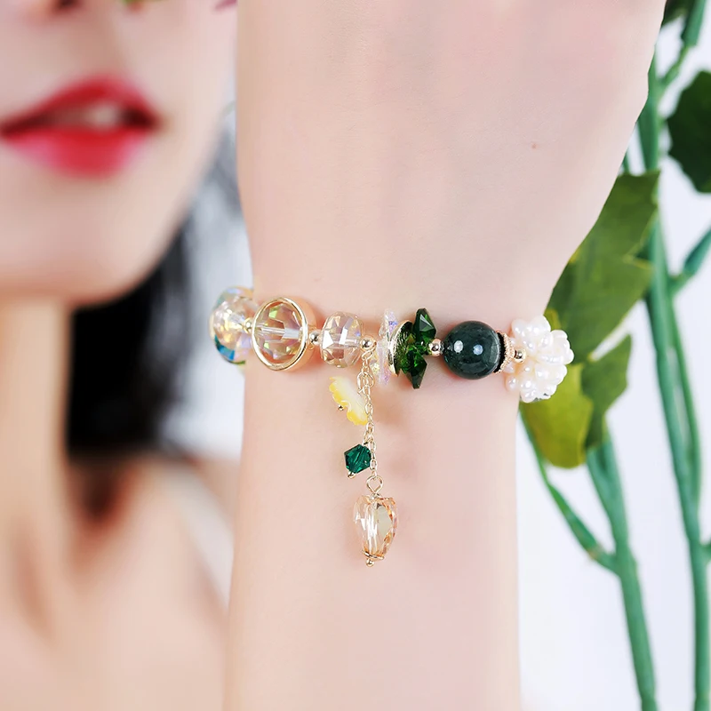 

Original handmade Austrian Crystal Bracelet Freshwater Pearl Love Pendant with Minor Design Fringe Women