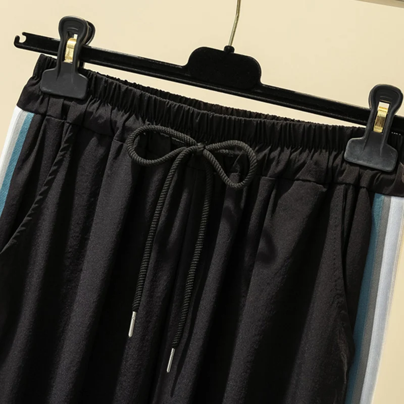 

Plus size Women Tie Feet Pants 2021 Spring Summer Loose Sports Harem Pants Women's Fashion Casual Pants Nine Points Pants 4XL