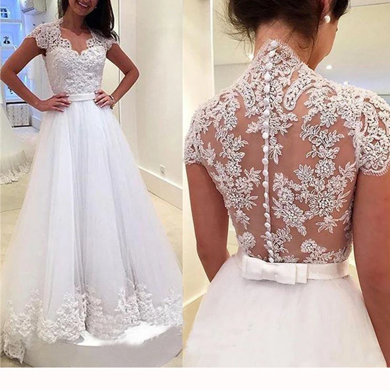 Свадебное платье трапециевидной формы с аппликацией Свадебные платья открытой