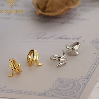 xiyanike silver color new hot sale snake shape hoop earring women fashion simple unique design 925 stamp handmade jewelry