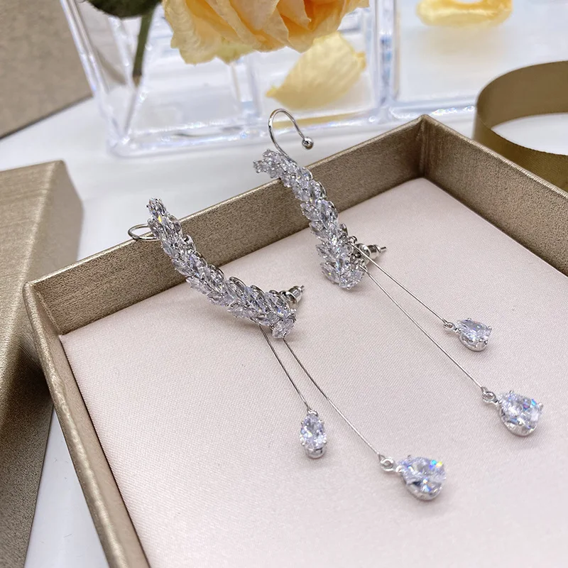 

Wheat ear bone clip ear row long tassel earrings