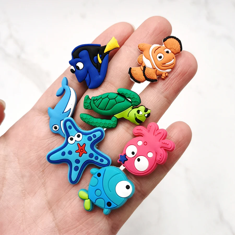 

New Design 1Pcs Cute Fishes PVC Shoe Charms Accessories Clownfish Dolphin Starfish Shoe Buckle Decoration Fit Croc JIBZ Kid Gift