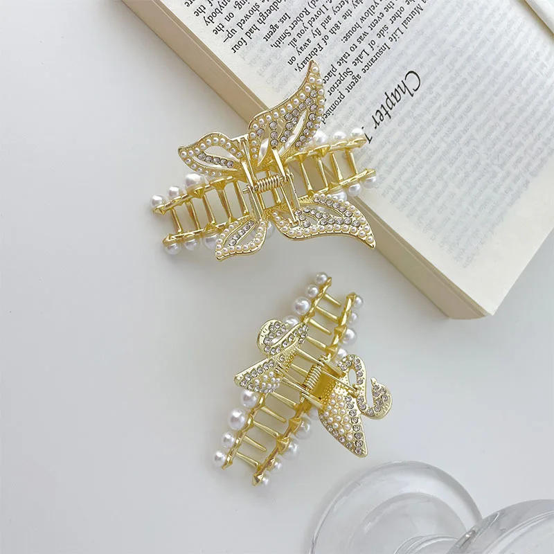 

Korean version of fairy temperament alloy swan butterfly hair clip plate hair catch clip shark clip back of head hair catch