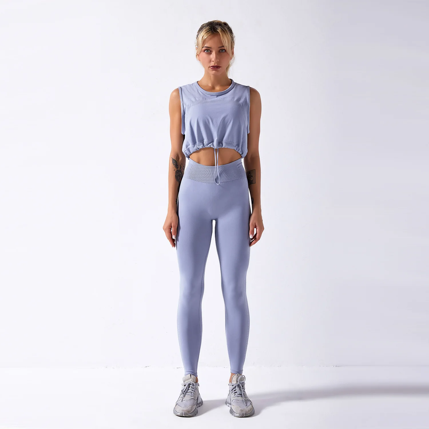 

Two-piece seamless yoga suit 2021 solid color sleeveless drawstring top trousers women