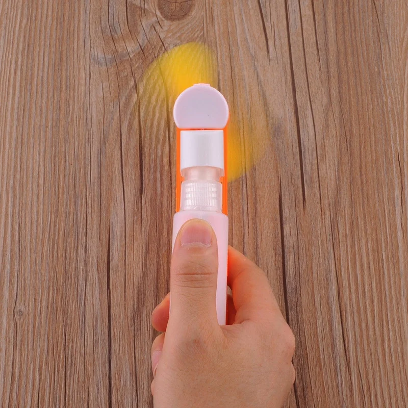 

Mini spray spray water portable cooling hand-held holiday travel bottle battery cooling fan