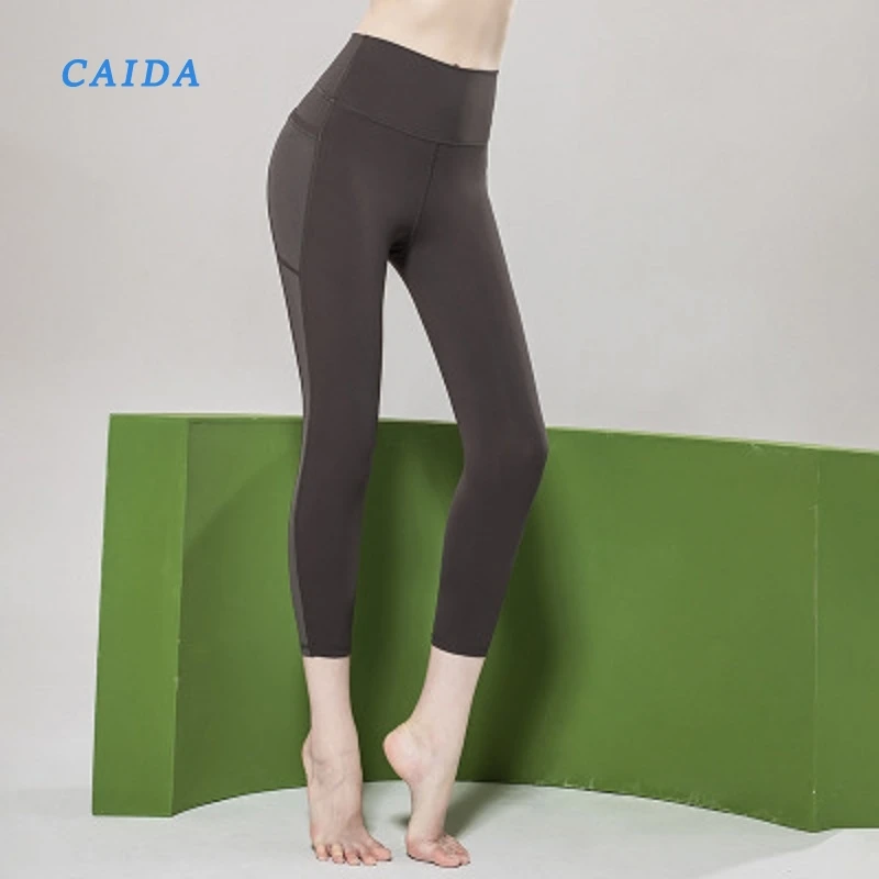 

CAIDA Mesh Stitching Yoga Pants Women's High Elastic Hip-lifting Sports Tights High Waist Pocket Fitness Pants Elastic