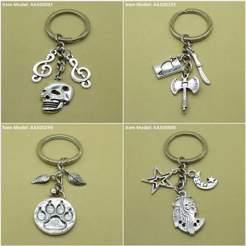 Брелок для ключей музыкальный топор с черепом ножом следами лапой листьями