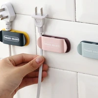 kitchen wall plug hook strong glue adhesive hook punch the wall power cord pull receive proof holder