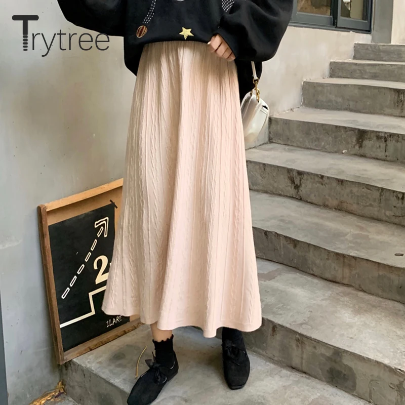 Женская трикотажная юбка в полоску до середины икры | одежда