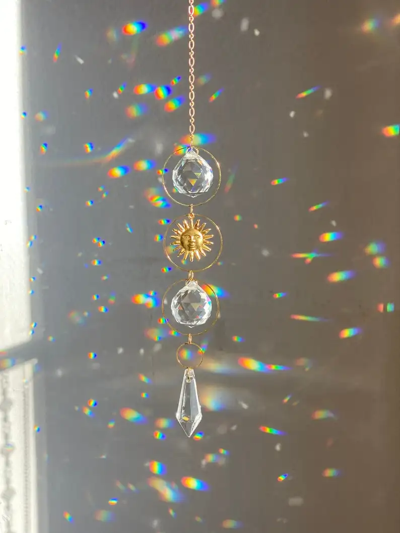 

Geometric sun suncatcher gold plated