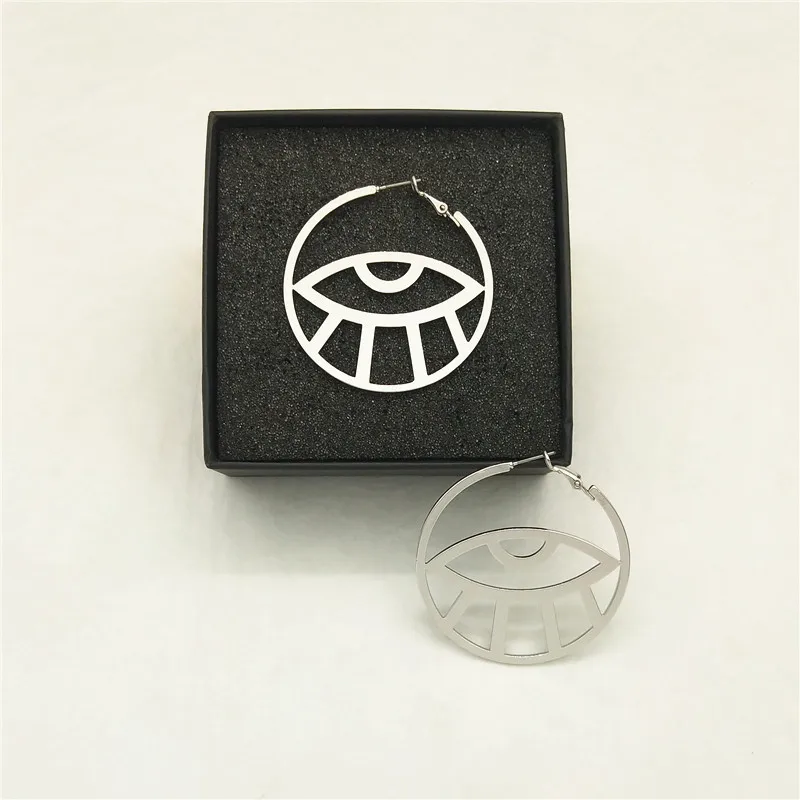 Модные серьги-кольца в абстрактном стиле с большими круглыми глазами золотого и