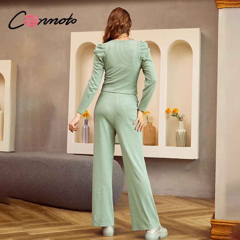 

Conmoto V-link long puff sleeve women suits Knitted Two-piece casual female playsuits High fashion solid women jumpsuits 2020