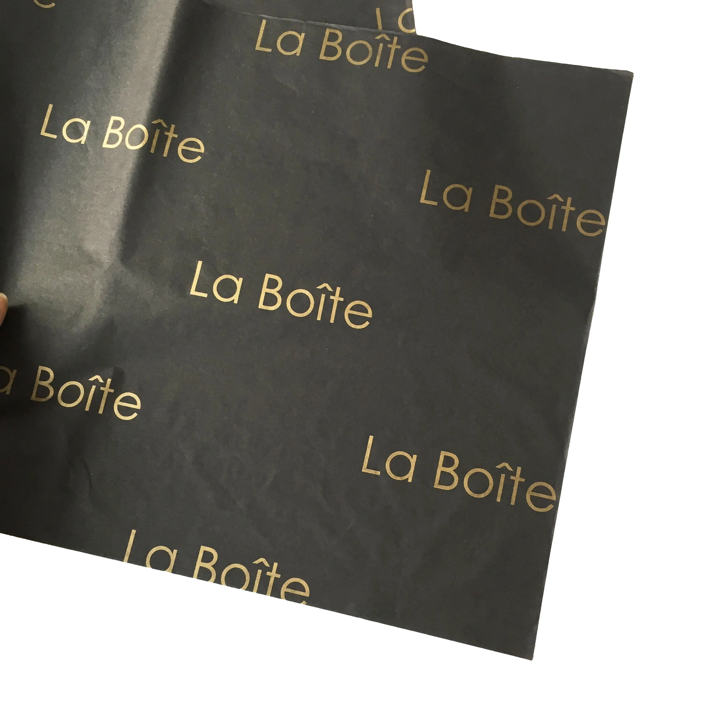 

Custom Tissue Paper Black Wrapping Paper Single Color Logo Decorative Paper for Clothes Gift Packaging