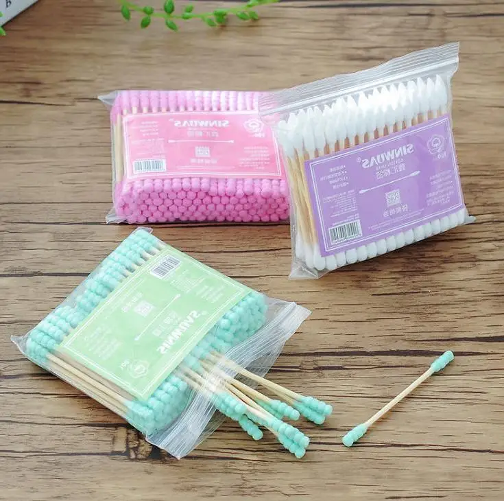 安い ニューキッズ双頭スパイラル綿棒、耳色綿棒ボックス、使い捨て綿棒家庭用品のギフト卸売