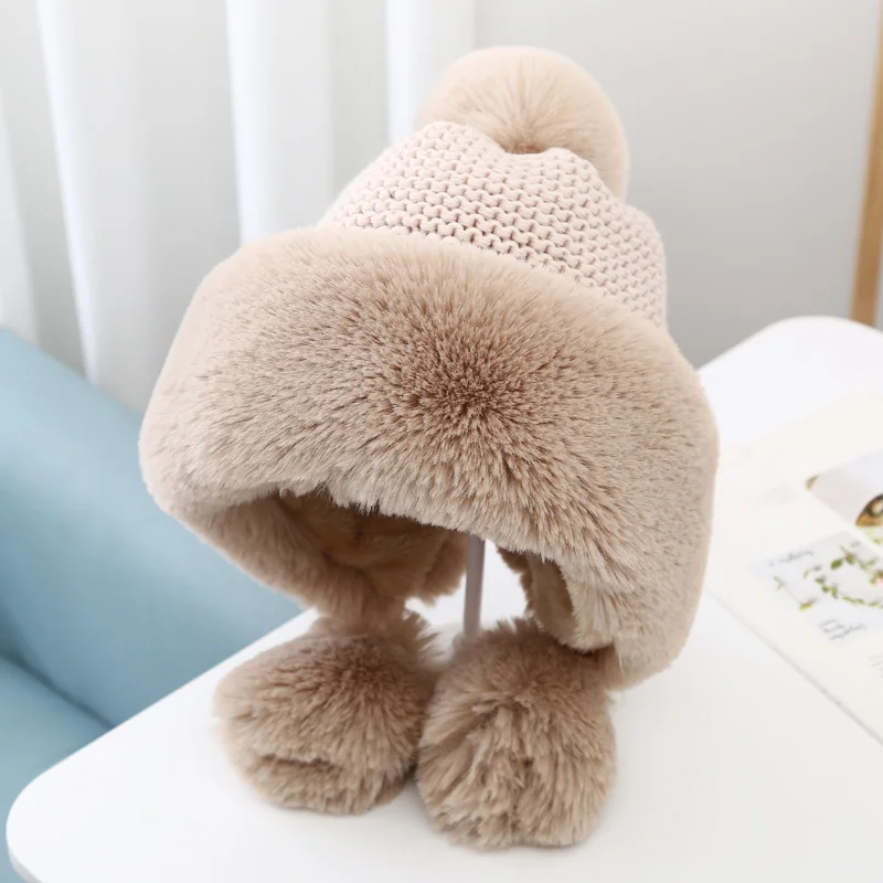 

Шапка-ушанка женская зимняя с помпоном из искусственного лисьего меха