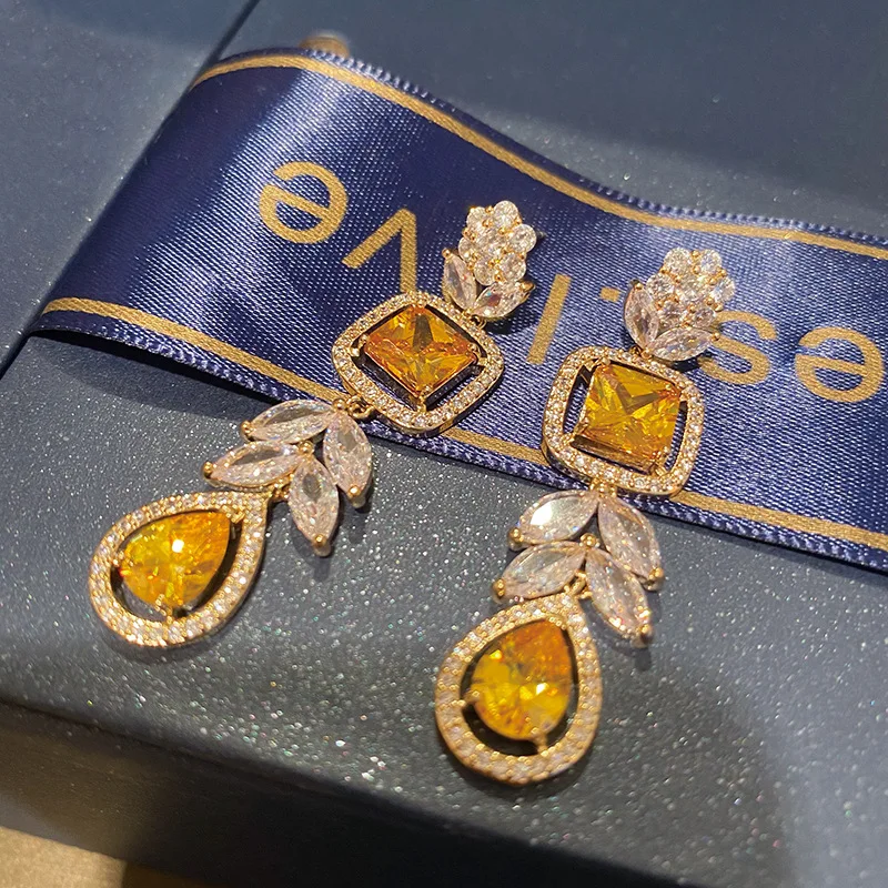 

Серьги с желтыми кристаллами пшеничные ушки длинные ювелирные изделия с кисточками в виде капель воды роскошные женские циркониевые камни ...