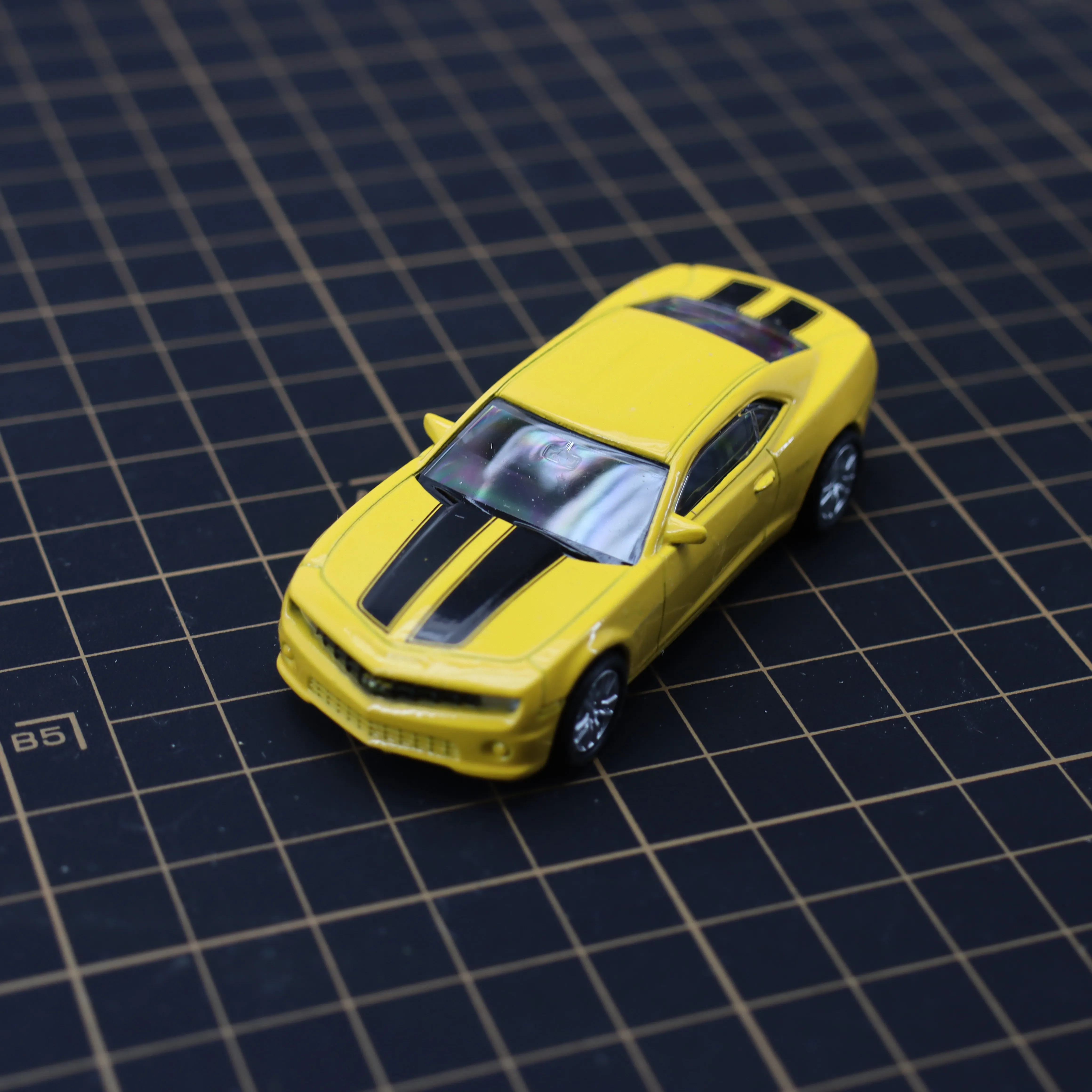 

Литая игрушечная машинка Camaro 1/64, подвижная