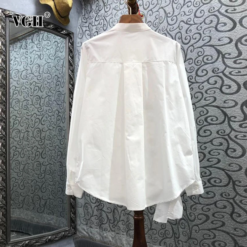 

VGH Irregular Patchwork Floral White Shirt For Women Stand Collar Long Sleeve Loose Solid Button Through Blouse Female Clothing