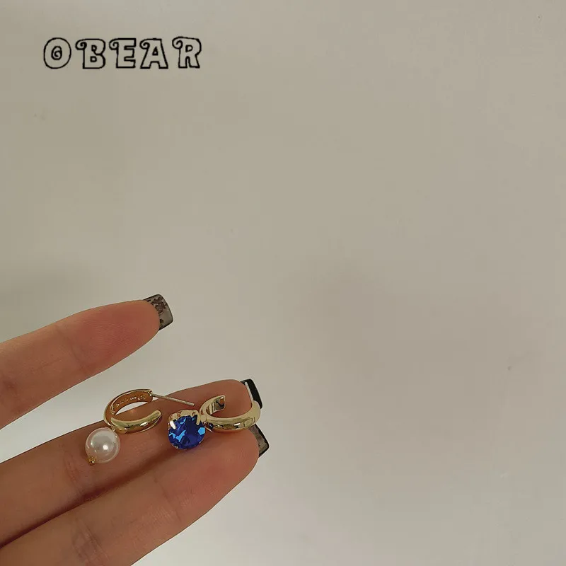 

OBEAR Asymmetrical Pearl Four Claw Oval Blue Crystal Stud Earrings Women Noble Temperament Wedding Party Jewelry