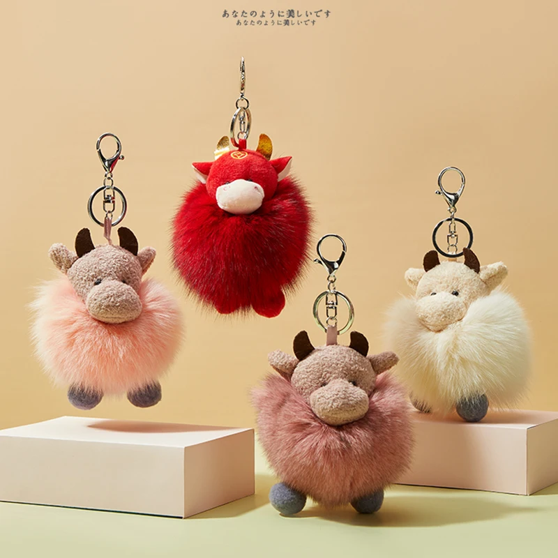 

Новинка, милый плюшевый брелок из натурального Лисьего и кроличьего меха в виде быка, коровы, брелок для женской сумки, подвеска-украшение