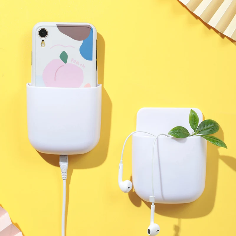 

Wall mounted Mini rack mobile phone remote control storage box with transparent nano glue