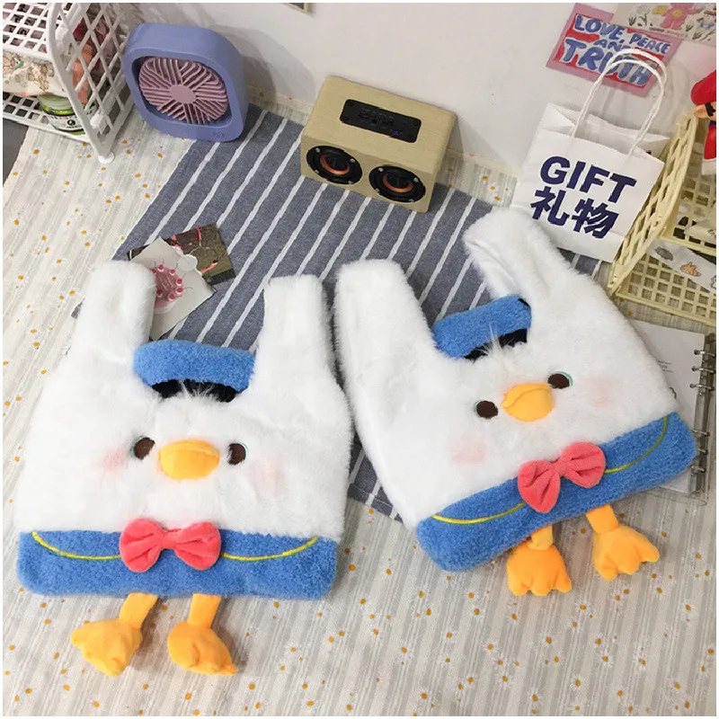 

Korean women ins portable cartoon duck plush handbag female 2021 new cute personality large-capacity shoulder bag