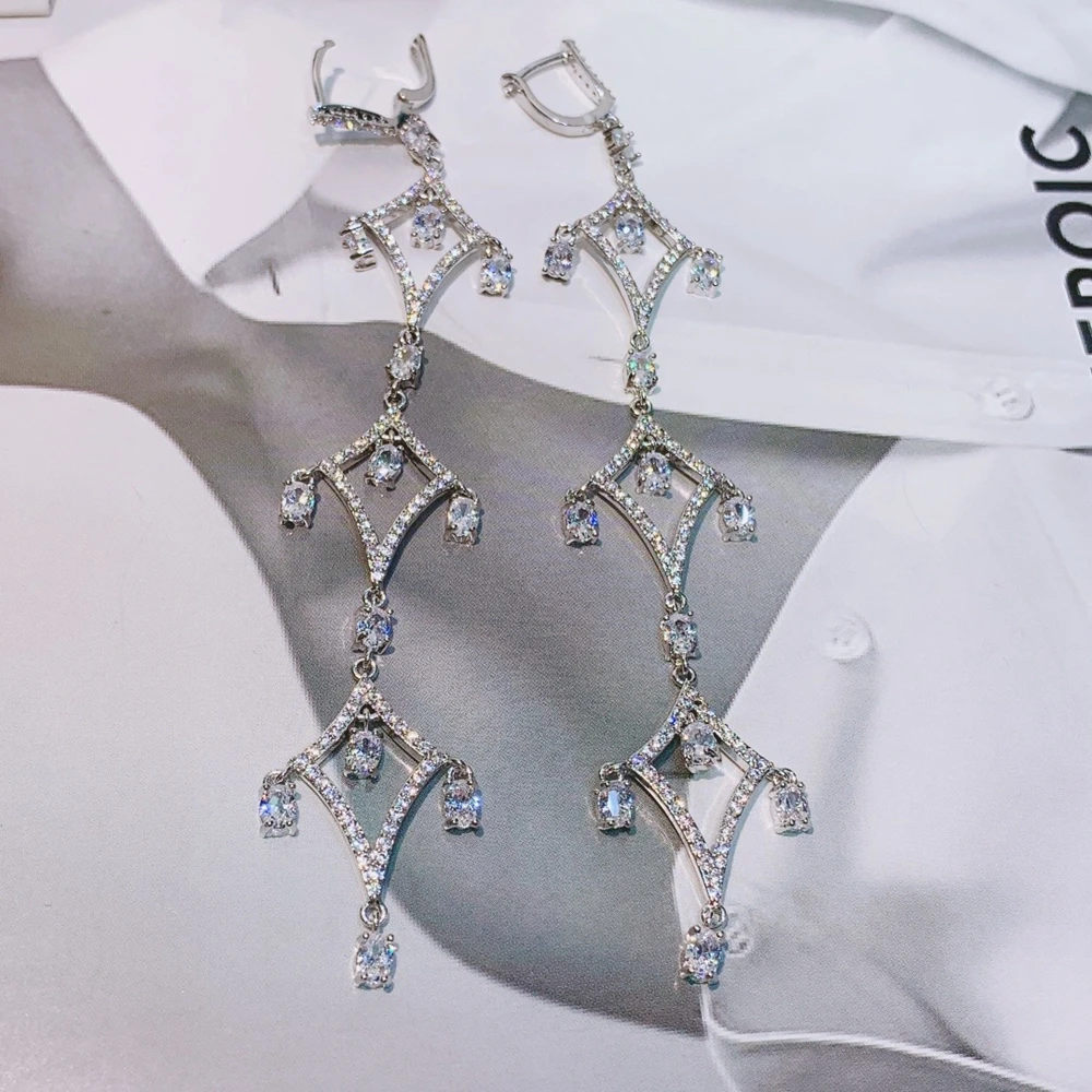 Женские свадебные серьги в виде ракушек с бриллиантами и кисточками S925