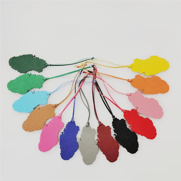 

Customized Genuine Leather Character Arabic Qatar Oman Saudi Arabia Map Bag Pendant Female Bag Hanging Jewelry Accessories