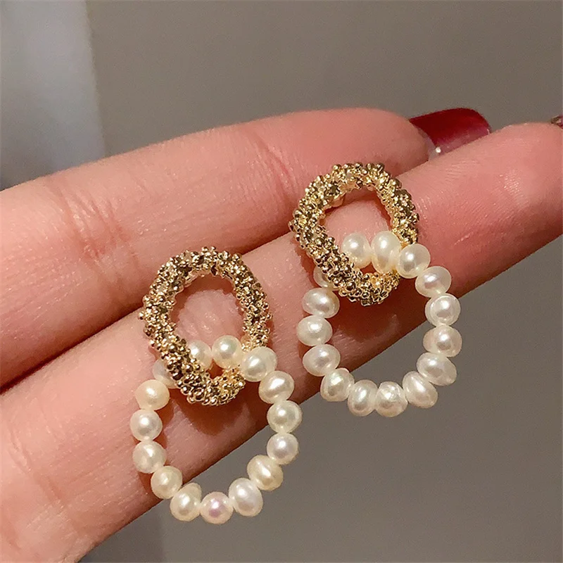 

New earrings Korean freshwater pearl earrings high sense of light luxury temperament earrings women