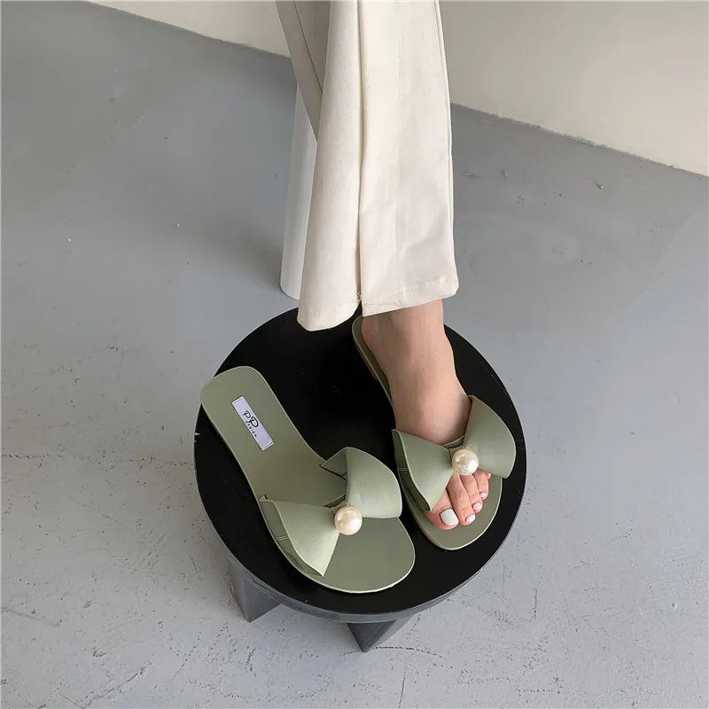 

2021 summer new open-toed pearl bow sandals and slippers flat sweet beach shoes flat heels