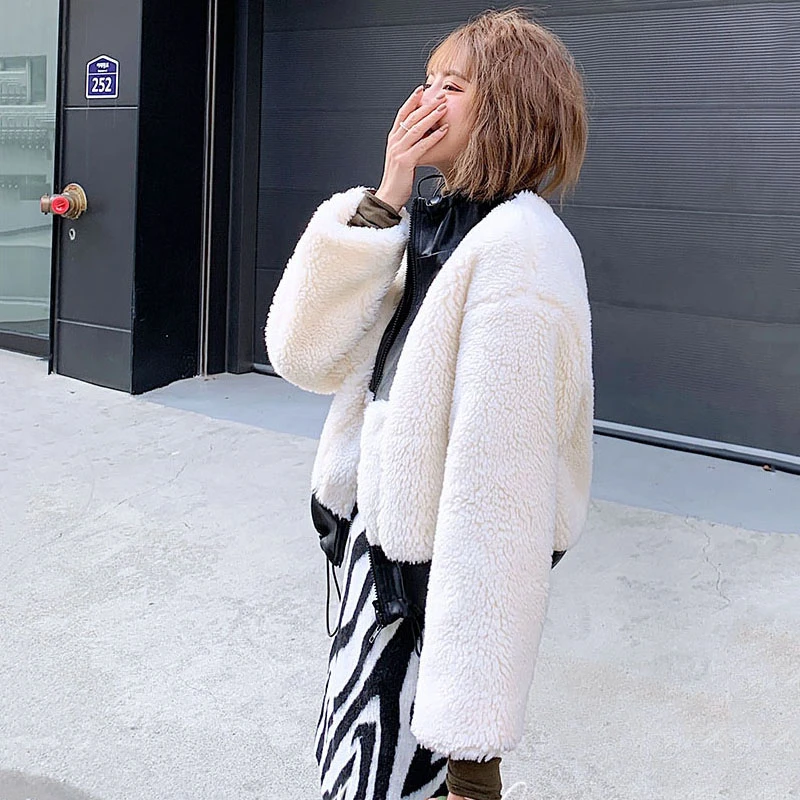 

Unua amo Winter Lambswool Jacket Women Short Stand-collar Faux Leather Coat 2021 Streetwear Fashion Imitation Fur Fleece Jacket