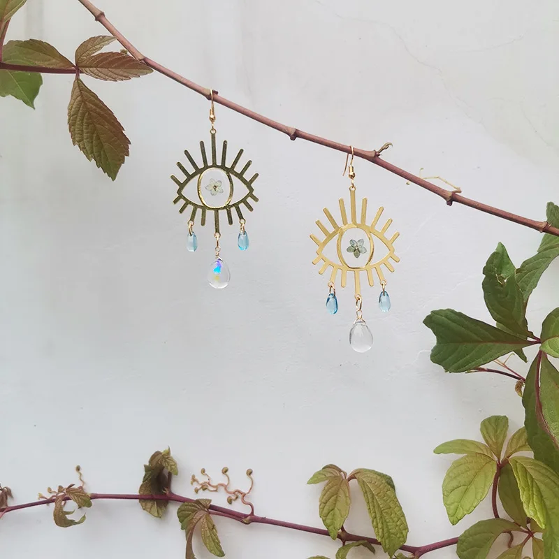 

Серьги из смолы «злые глаза», латунь, капли воды