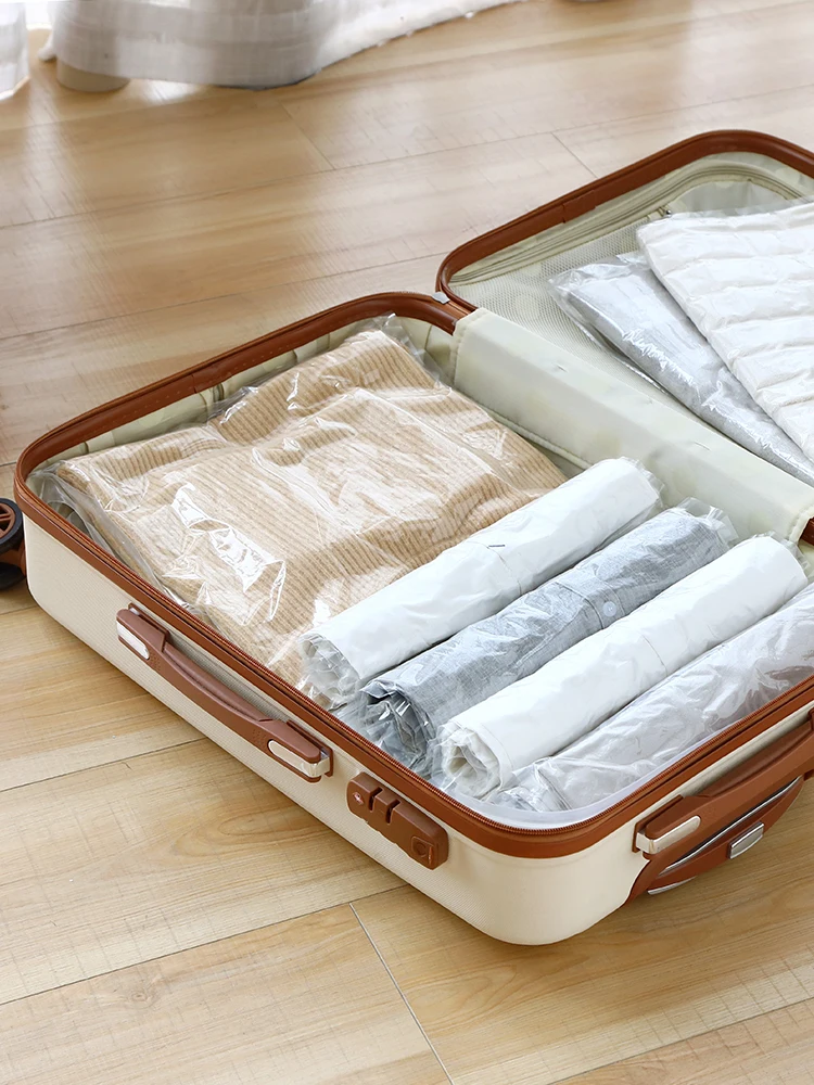 

Travel hand-rolled vacuum compression storage bags packed luggage-free pumping equipment dedicated artifact