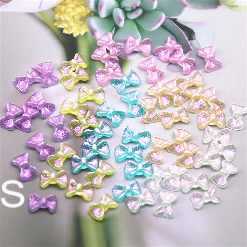 

50pcs mini size aurora multicolor Shiny bow resin Flat back Cabochon nail Art Supply DIY accessories