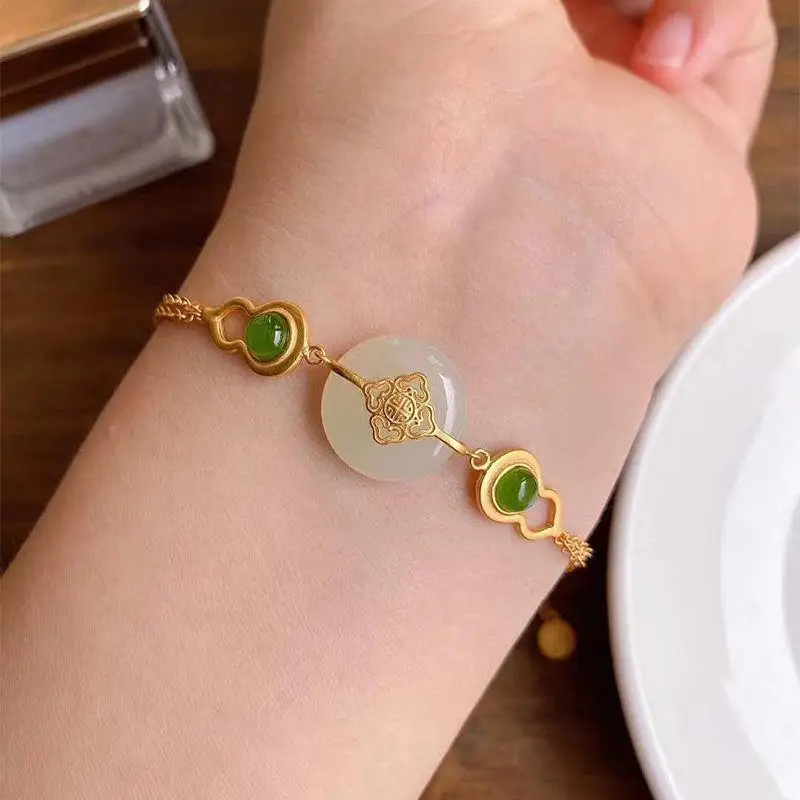 

Antique Chinese style small pure gold gourd S925 sterling silver inlaid natural Hetian jade and peace buckle bracelet for women
