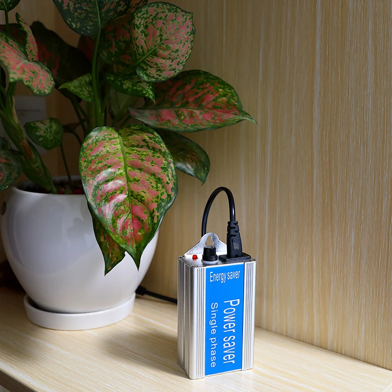 Бытовой электрический экономайзер интеллектуальный энергосберегающий штекер