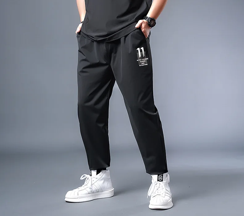 

high quality summer men casual simple pants plus size 7XL letter fashion high street pants korea style loose pants thin