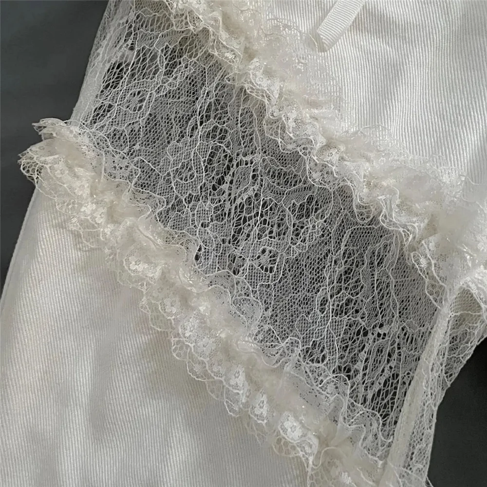 Джинсы-клеш Y2k с кружевом разрезами по бокам зауженные в готическом стиле уличные