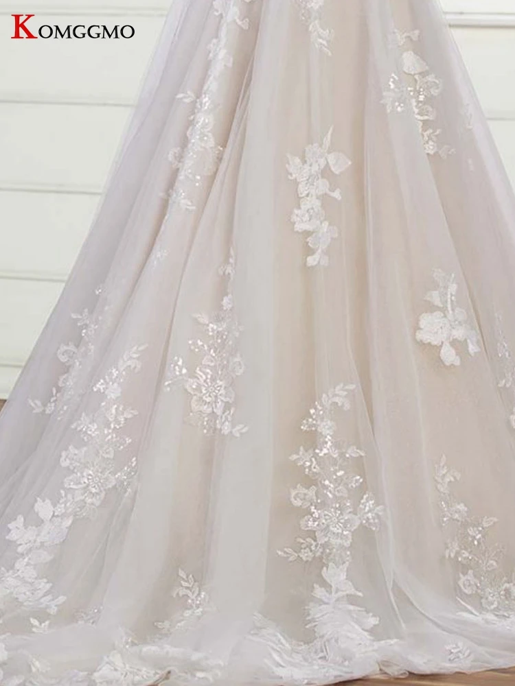 

100% Real Spaghetti Straps Embroidery Appliques Tulle Backless Bridal Ball Gown Luxury V-Neck Lace Appliques Tulle Wedding Dress