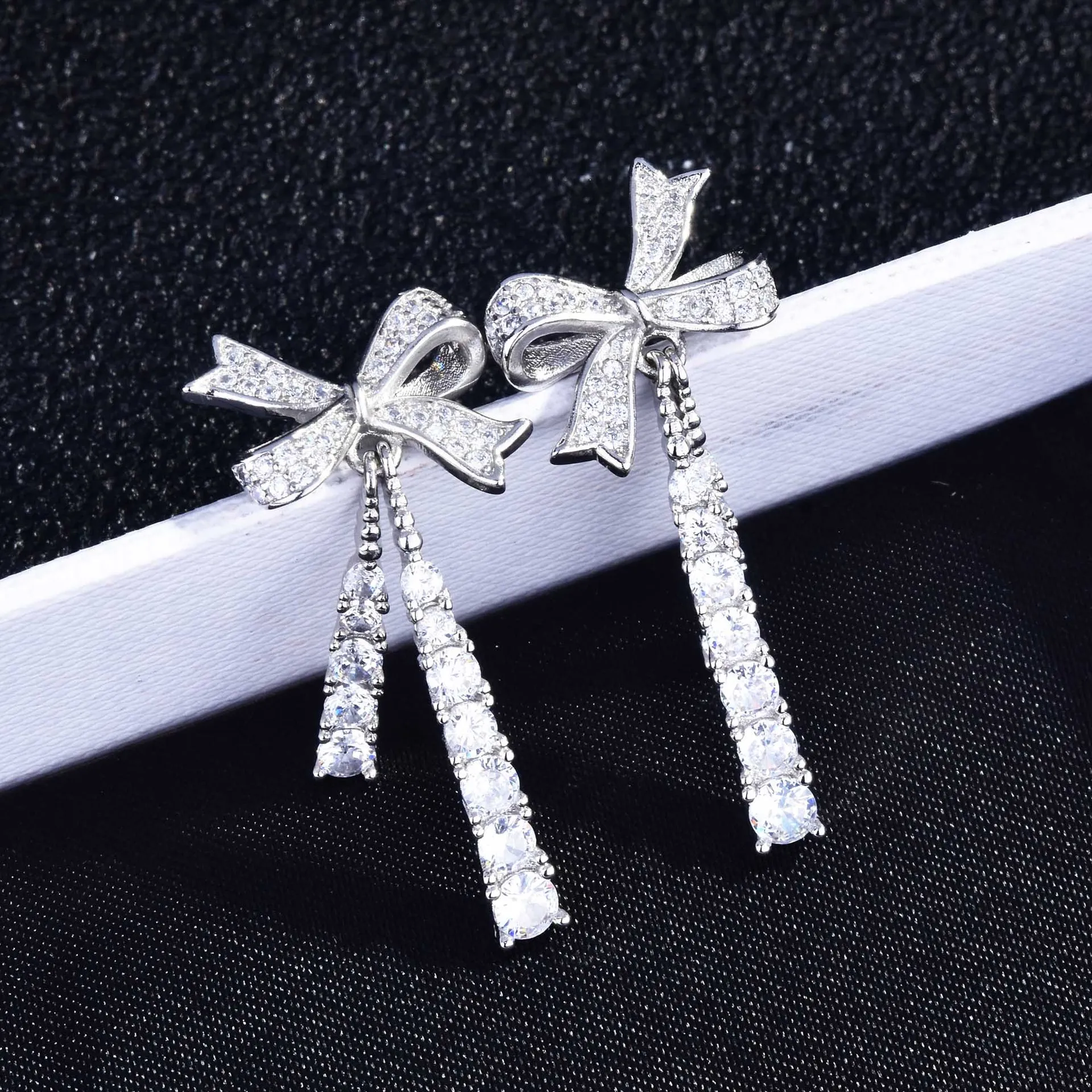 

Korean Exquisite 925 Silver Color Bow Long Dangle Earrings Temperament Luxury Zircon Bowknot Design Earring For Women Jewelry