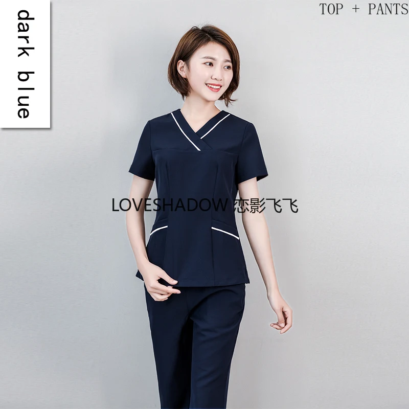 

Women Scrub Suit Mock Wrap Nurse Uniform Cross Collar Doctor Workwear Scrub Top Color Blocking Cotton Scrub Trouses Spa Uniforms