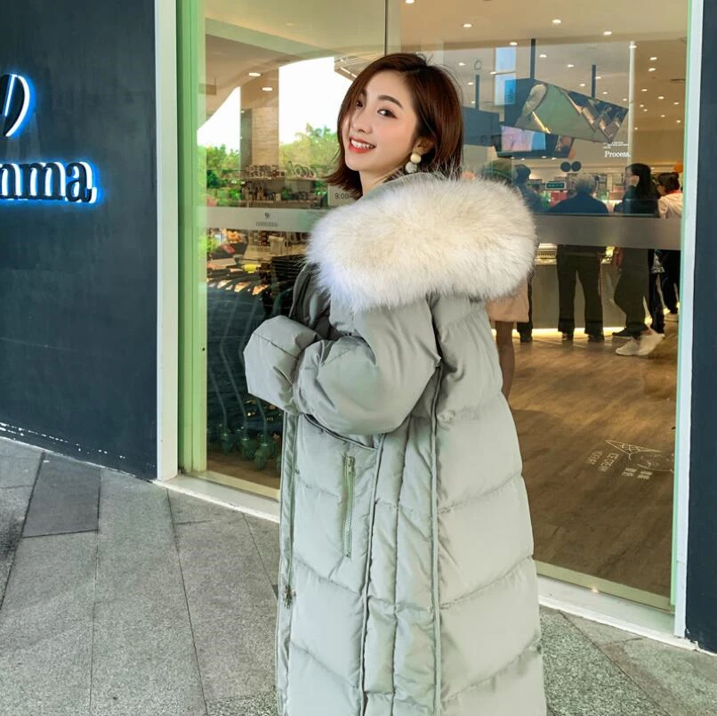 Женский длинный пуховик с капюшоном зимний большого размера воротником из меха