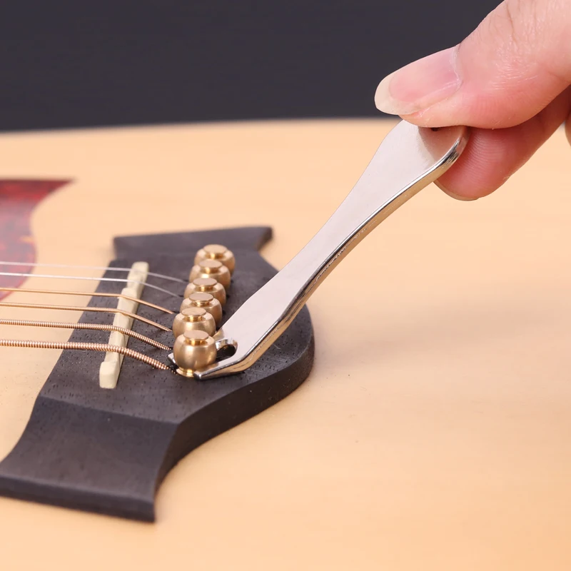

Guitar String Tool Stainless Steel Acoustic Guitar String Nail Puller Bridge Pin Remover Convenient Tool