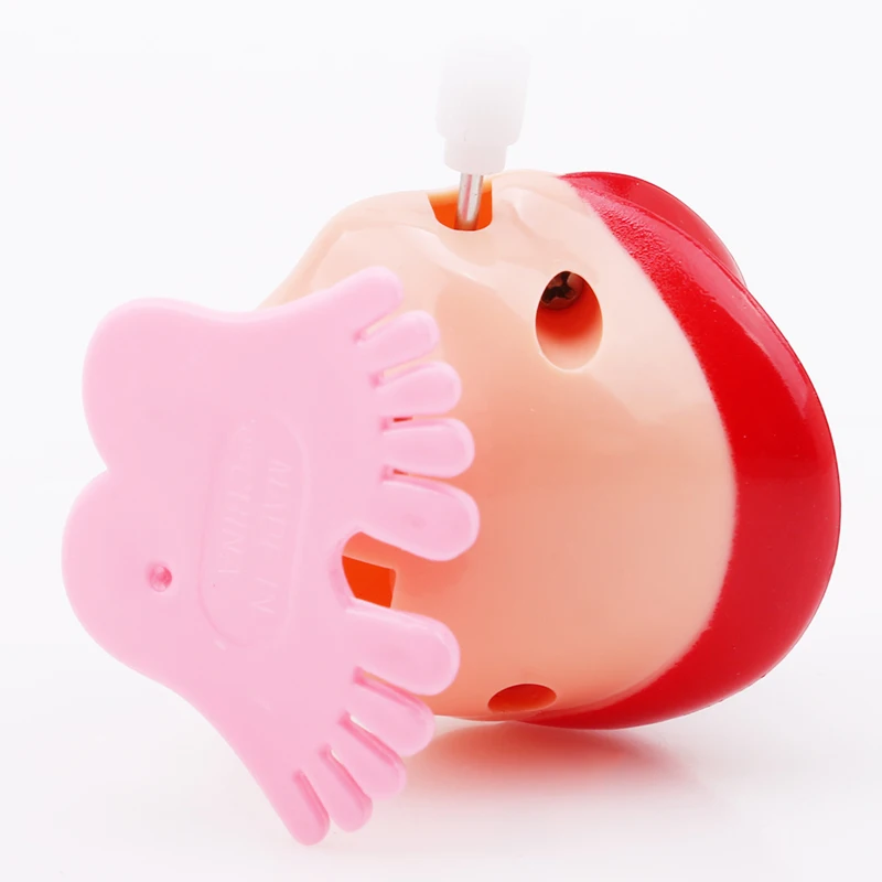 

Spring Wind up Jump Tooth Dental Gift Dental Toys wholesale spring Plastic Toys Jump Teeth Chain for Children Cute Toys For Kids