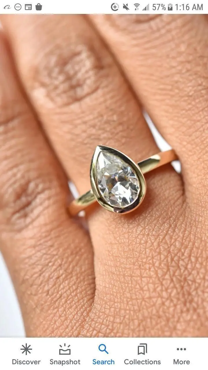 

10k gold with 2ct(7x10mm) def pear moissanite ring