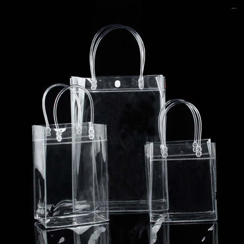

Hot 1 Pc Transparent Soft PVC Gift Tote Packaging Bags With Hand Loop Clear Plastic Handbag Cosmetic Bag Jewelry Organizer