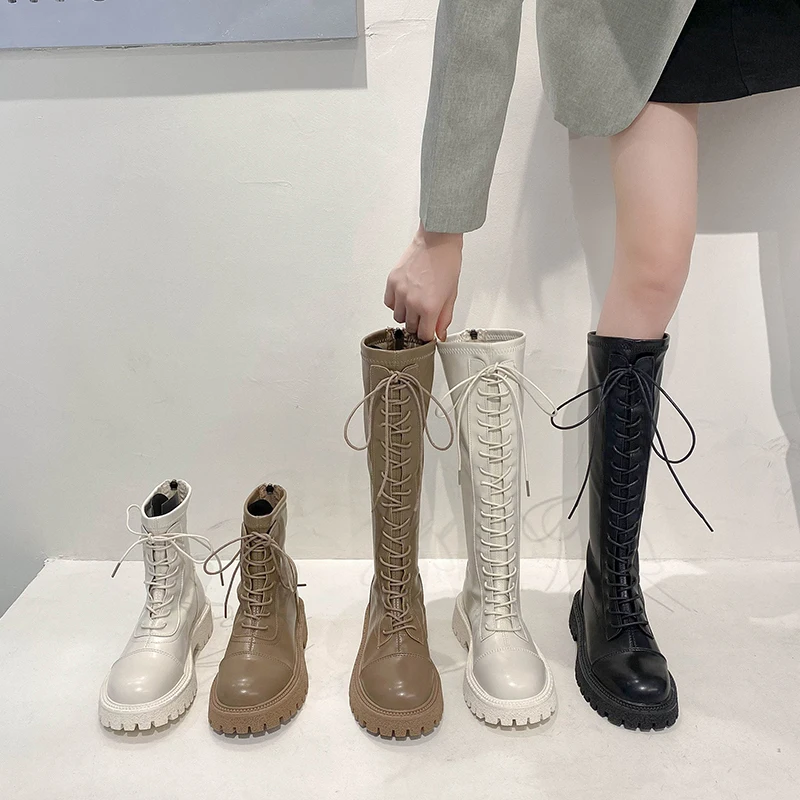 

Женские сапоги на молнии сзади, до середины икры, с круглым носком